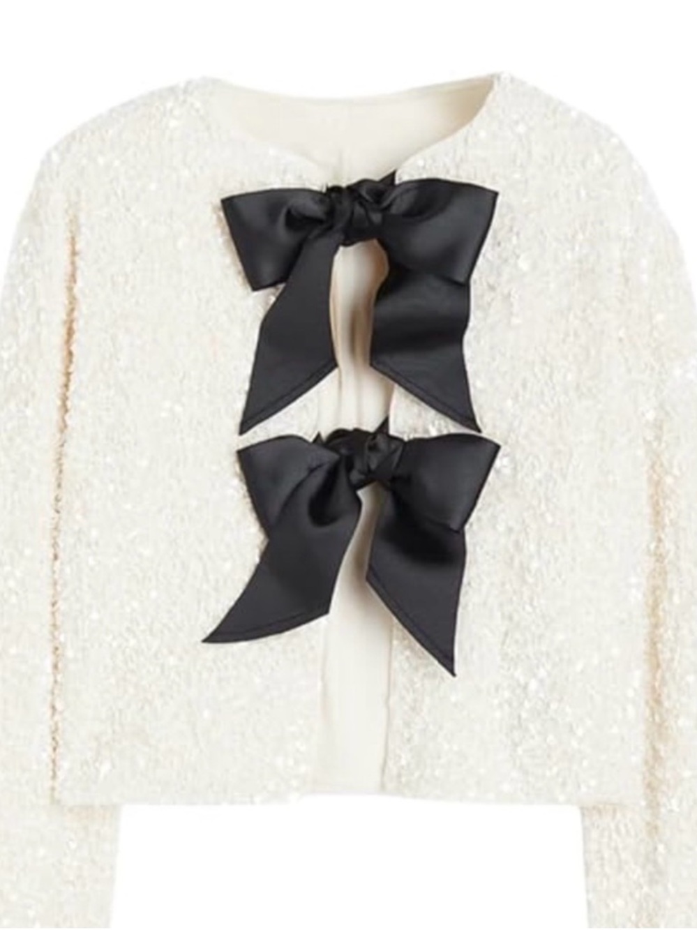 A Loves A White Sequin Jacket with Black Bow Closures